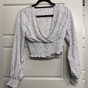 Polka dot top with singed bottom!